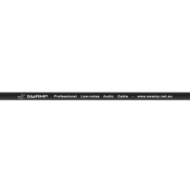 Close-up of black audio cable showing SWAMP branding and text indicating professional low-noise audio cable specifications and website.