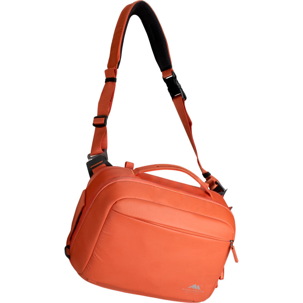 Orange shoulder bag with adjustable straps and zippered compartments, displayed against a white background at a three-quarter angle.