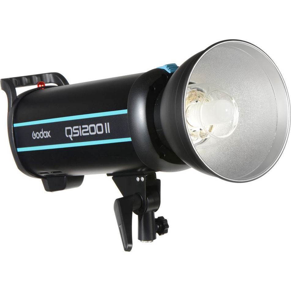 Side view of black Godox QS1200II studio flash with cyan stripes, mounted on stand, showing reflector and flash head.