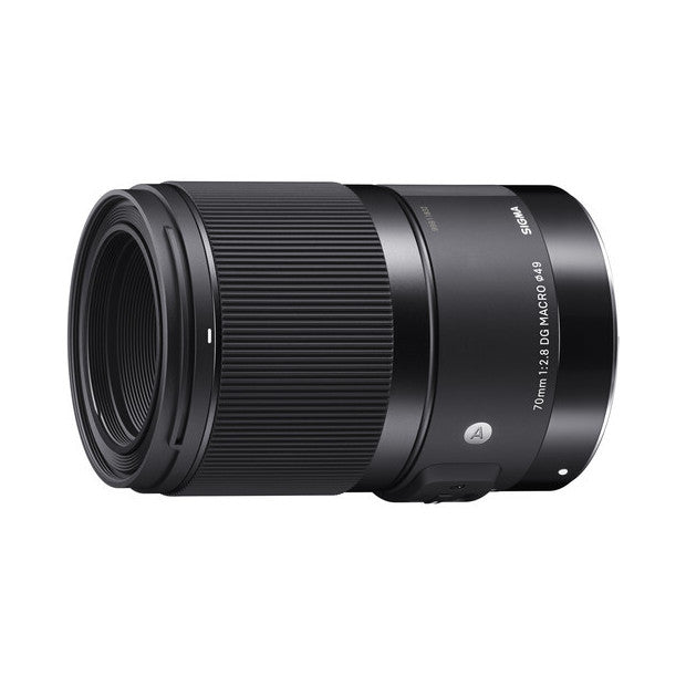 Black macro lens shown from the side angle, displaying the barrel with ribbed focusing ring and text labeling "70mm f/2.8 DG Macro