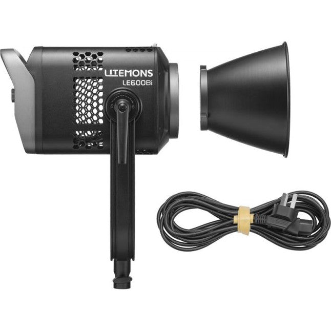 GODOX Litemons LE600Bi LED light shown from front with reflector cone and power cable included in kit layout.
