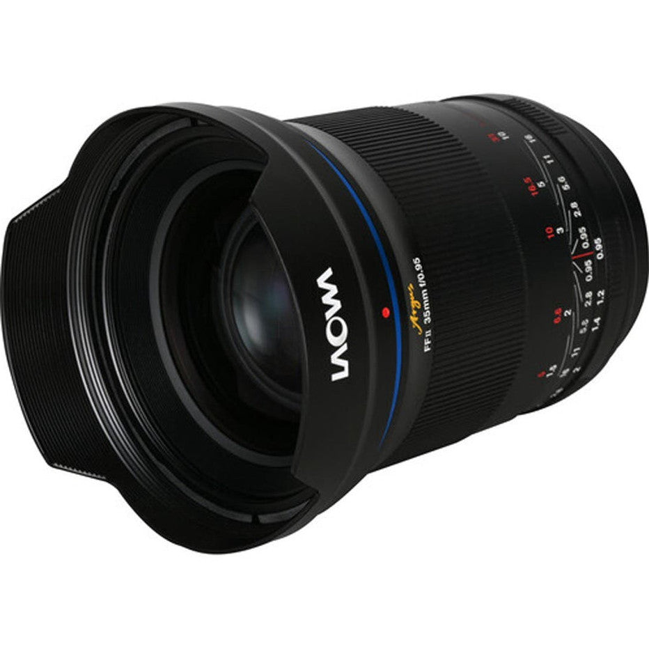 Angled three-quarter view of a black Laowa Argus 35mm f/0.95 lens with blue accent line and aperture dial visible on the barrel.