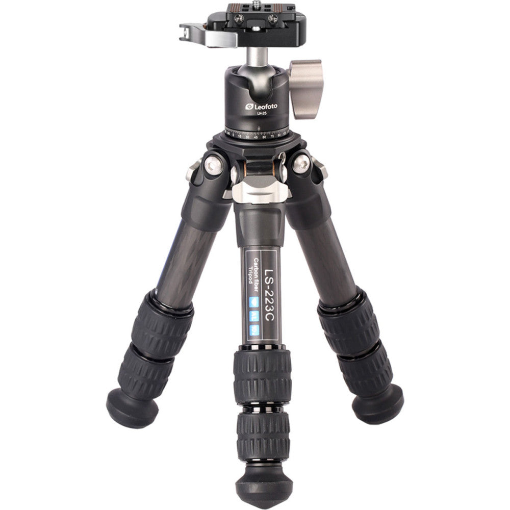 Black carbon fiber tripod with ball head mounted on top, shown from front view against white background.