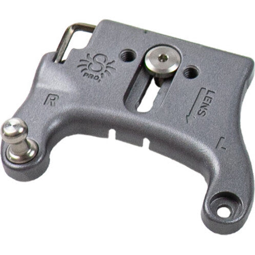 Gray metal camera mounting plate with adjustment knob, pin attachment, and mounting holes, shown from angled front view against white background.