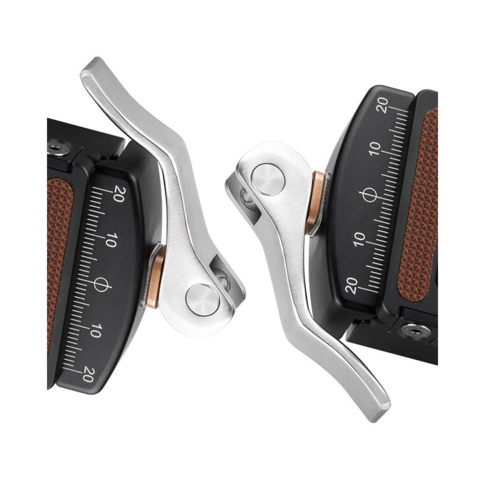 Three views of a silver and black ball head with brown leather accents, showing the spherical joint, lever clamp, and measurement scales from different angles.