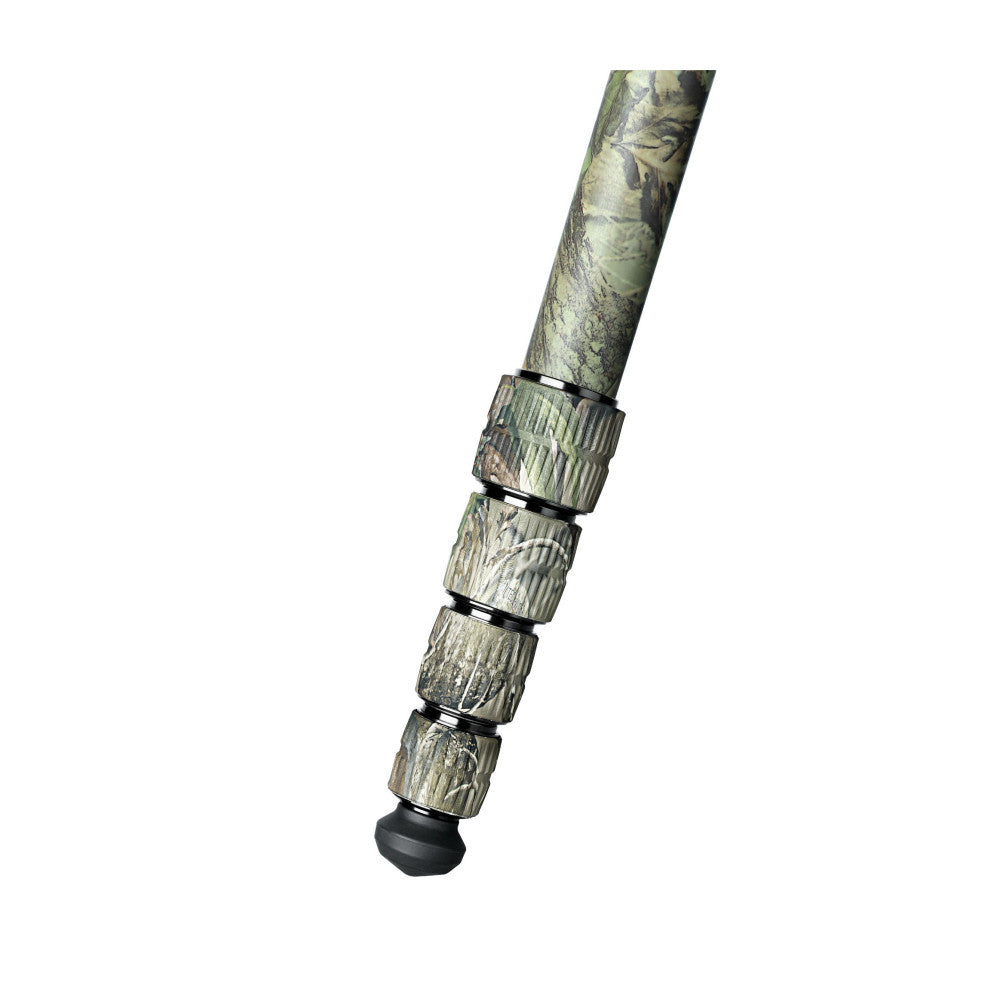Close-up detail of tripod legs showing camouflage pattern sections with black locking bands and rubber foot against white background.