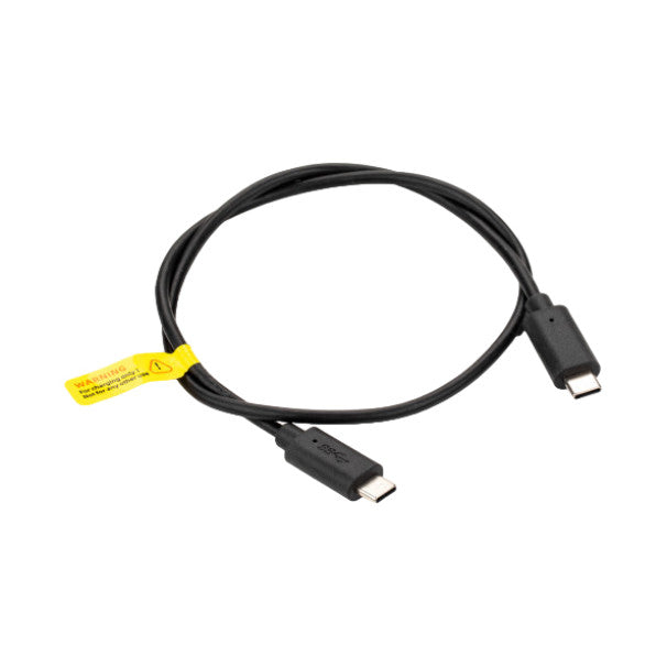 Black USB-C charging cable with yellow label tag coiled against white background, showing both connector ends.