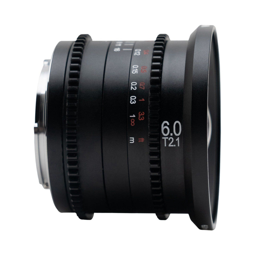 Side view of a black Laowa 6mm T2.1 cinema lens showing focus and aperture rings with markings and gear teeth for follow focus systems.