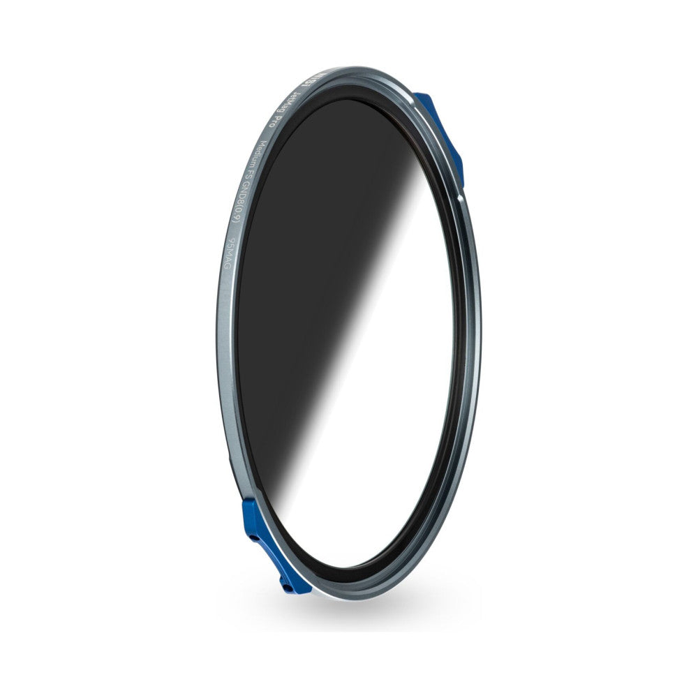 Angled view of a circular magnetic filter with gray and black rings, blue adjustment tabs visible on sides, mounted vertically against white background.