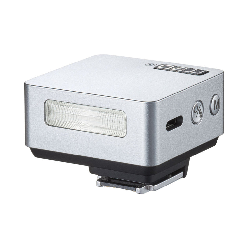 Silver compact camera flash with Ricoh mount, shown from angled front-right view against white background.