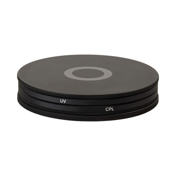 Stacked view of two circular lens filters labeled UV and CPL, showing their threaded edges and dark glass surfaces from above.