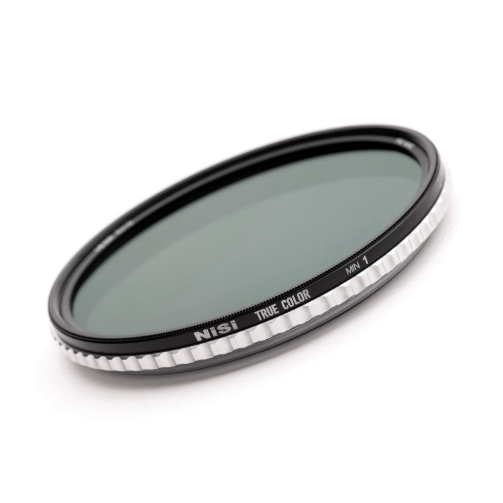 NiSi 95mm circular variable ND filter shown at an angle, displaying the black metal frame with white adjustment markings and "TRUE COLOR" labeling on the ring.