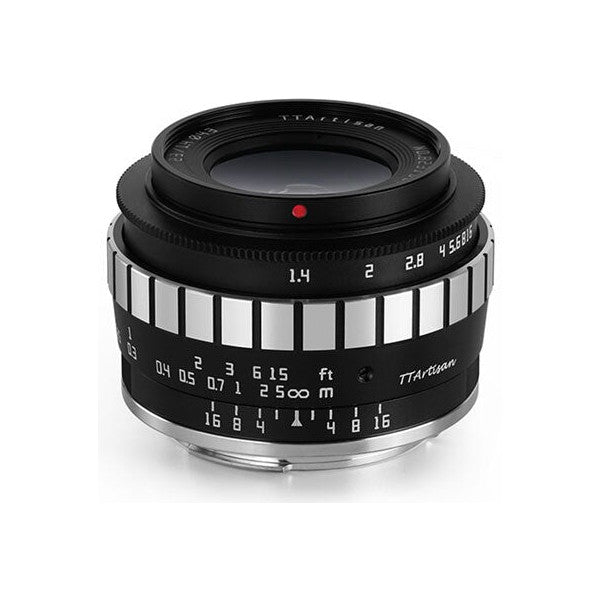 Black manual focus lens shown from front angle, displaying aperture ring, focus scale, and distance markings against white background.