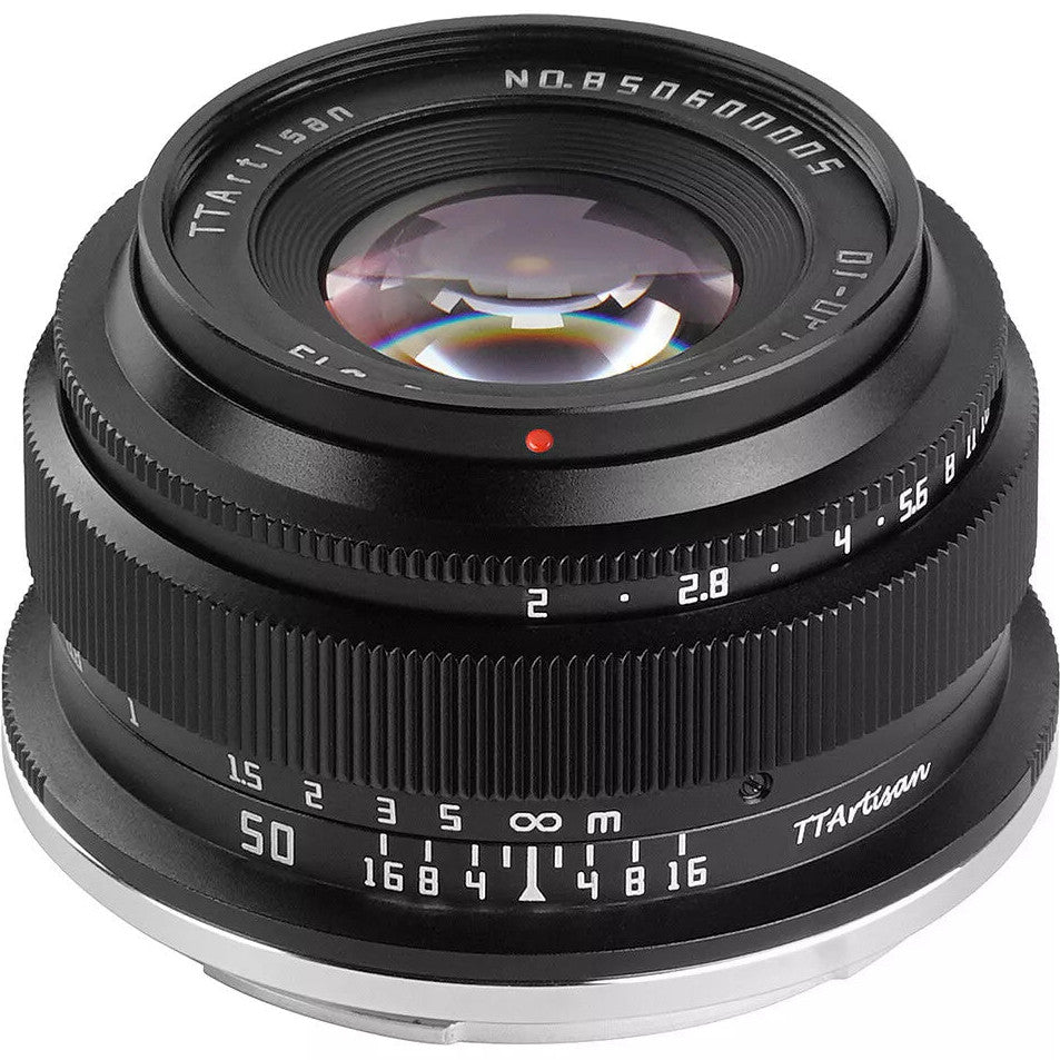 Black TTArtisan 50mm f/2 lens for Nikon Z mount shown from front angle, displaying glass elements, focus ring, and aperture markings.