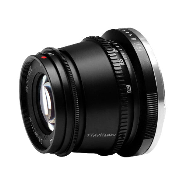 Black TTArtisan 35mm f/1.4 lens shown from the side angle, displaying the barrel, focus ring, and Sony E-mount rear element against a white background.