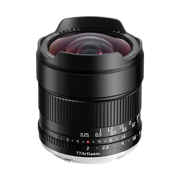 Black TTArtisan 10mm f/2 ultra-wide lens for Fujifilm X mount shown from front angle, displaying front lens element, focus ring, and aperture scale markings.