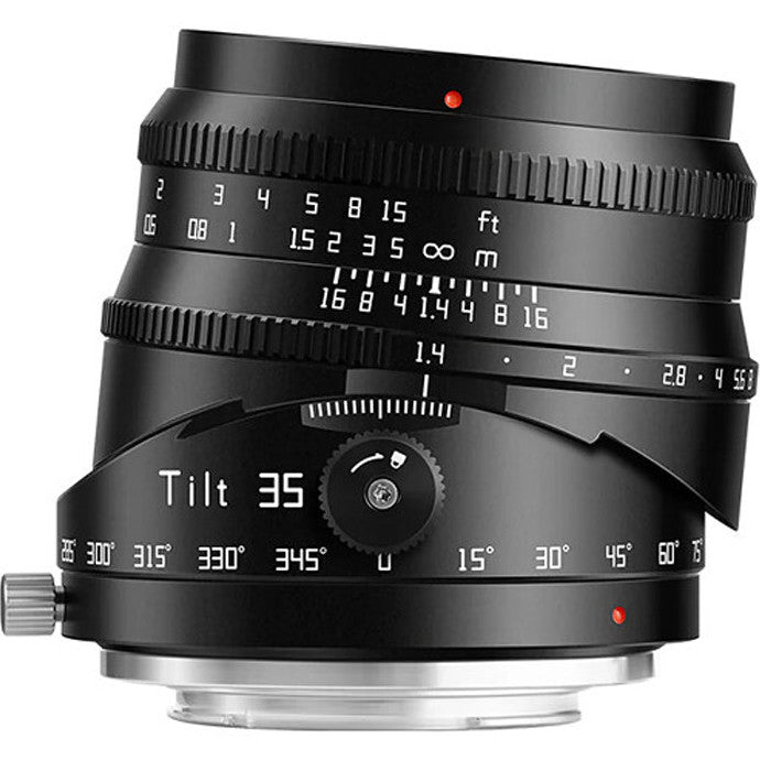 Black tilt-shift lens shown at an angle displaying focus ring, aperture markings, tilt mechanism with 35mm focal length indicator, and distance scales in feet and meters.