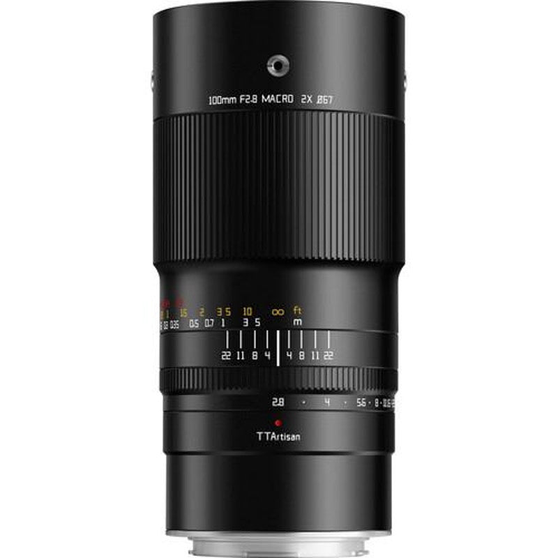 Black macro lens photographed from the front, showing focus ring, aperture scale, and TTArtisan branding against white background.