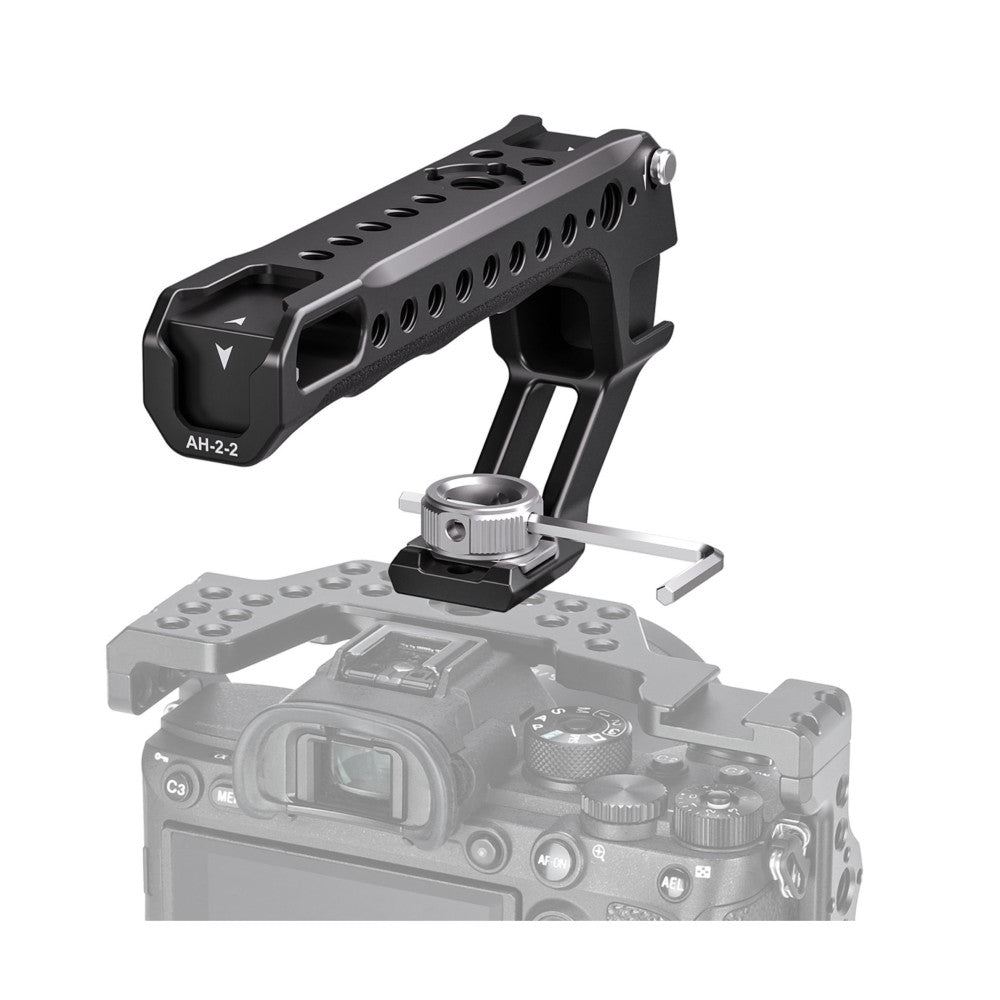 Black top handle with perforated design mounted on camera body shown at angled perspective view.
