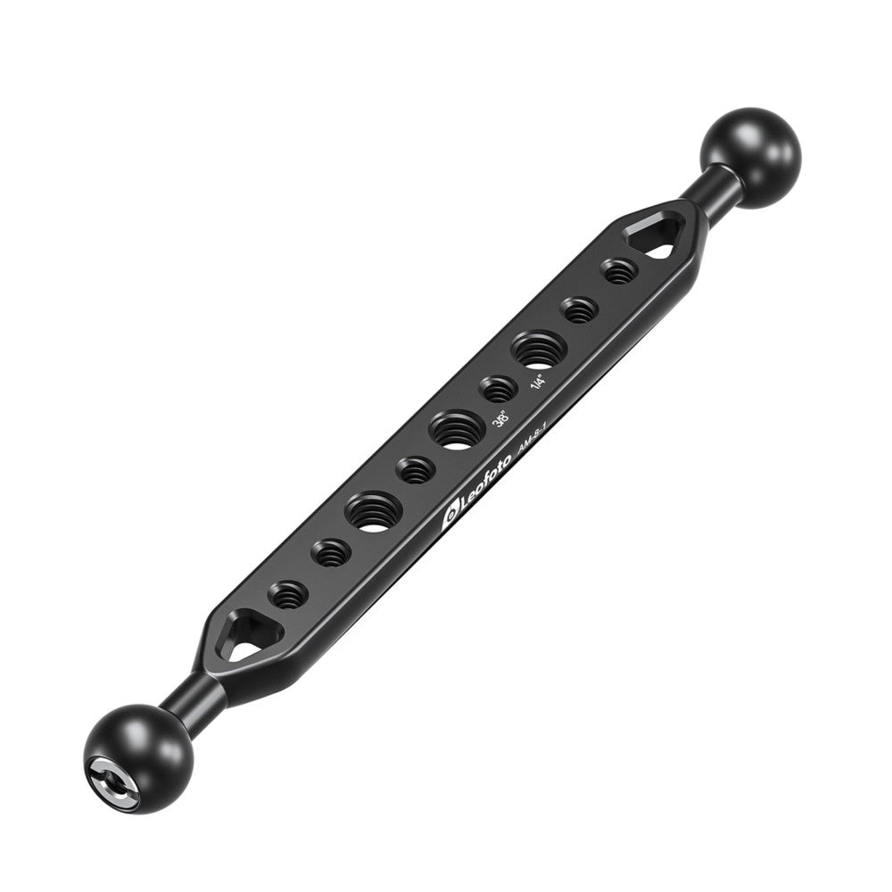 Black aluminum modular camera mounting bar with ball heads at each end and multiple threaded sockets along its length, shown at a diagonal angle.