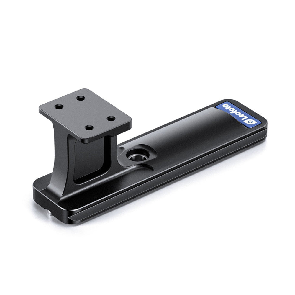 Black Arca-style lens foot with mounting plate shown at three-quarter angle, displaying the rectangular base, vertical attachment post with four mounting holes, and blue branding label.
