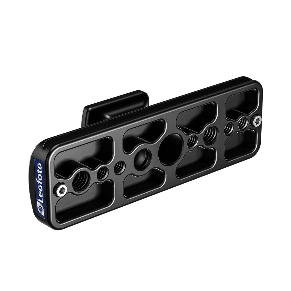 Black metal Arca-Swiss lens foot with multiple mounting slots and adjustment knobs, shown in angled isometric view against white background.