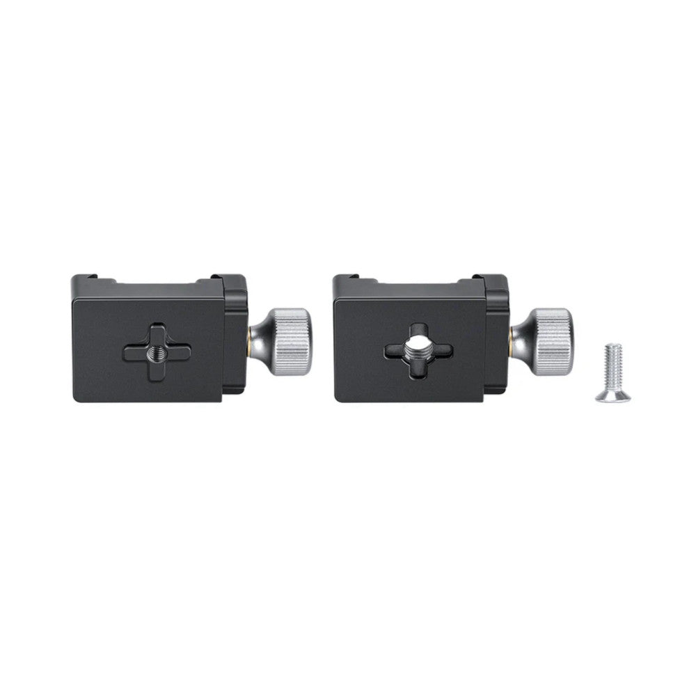 Two black camera clamps with metal knobs and a screw shown separately against white background, display view of components.