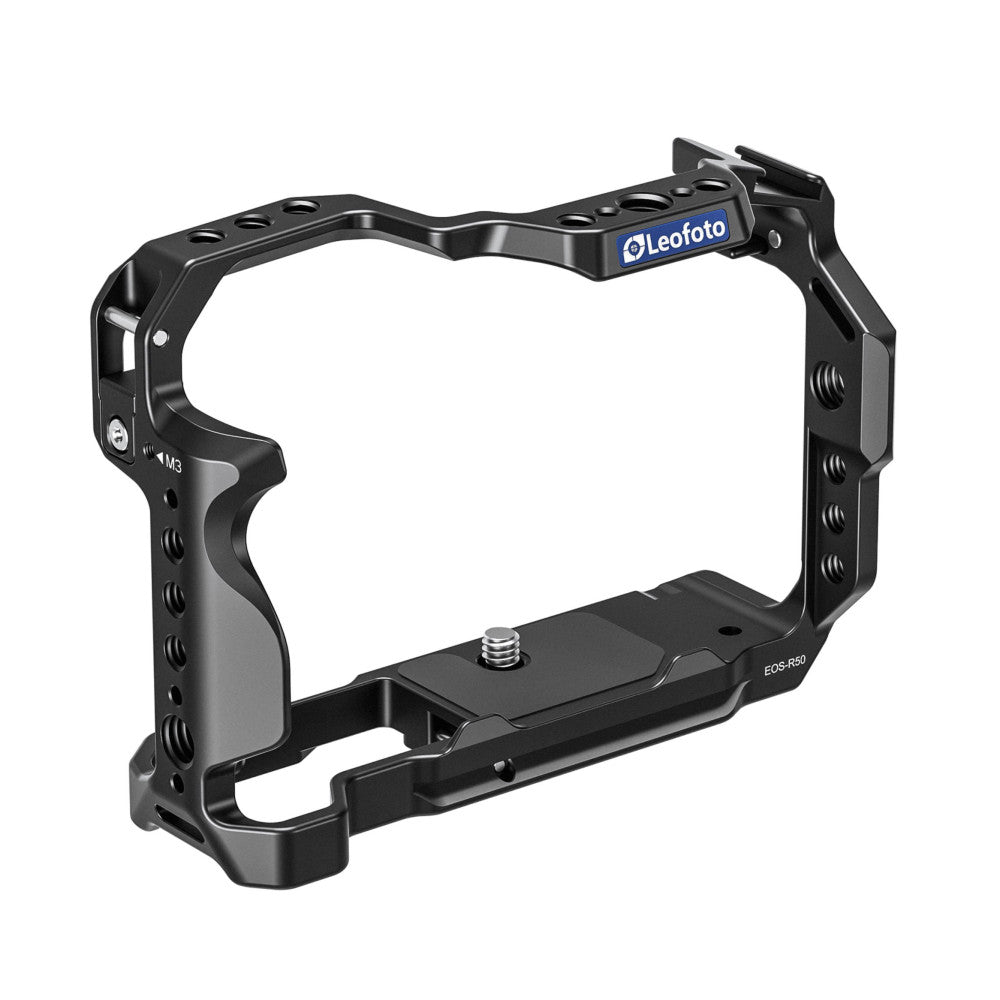 Black aluminum camera cage with top handle and side grip, angled three-quarter view against white background, showing mounting points and M3 designation.