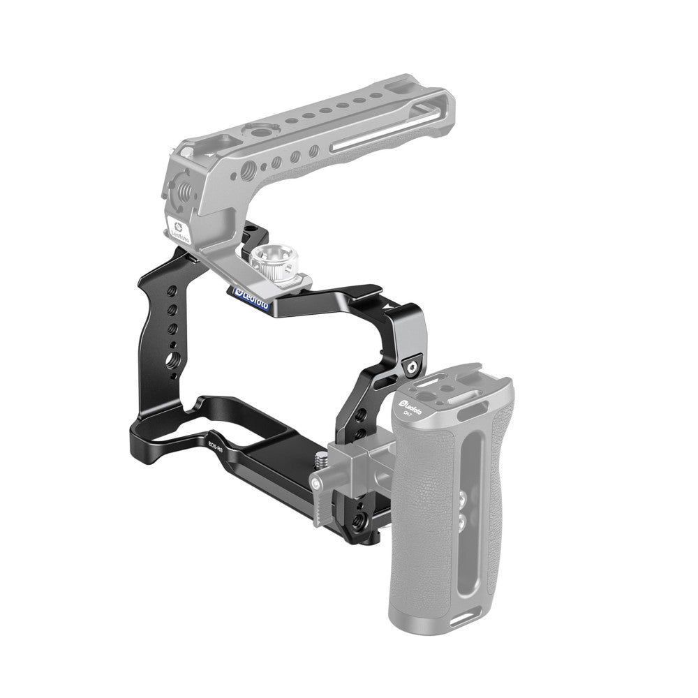 Isometric view of black aluminum camera cage with top handle and side grips, designed to fit Canon EOS R8 mirrorless camera body.