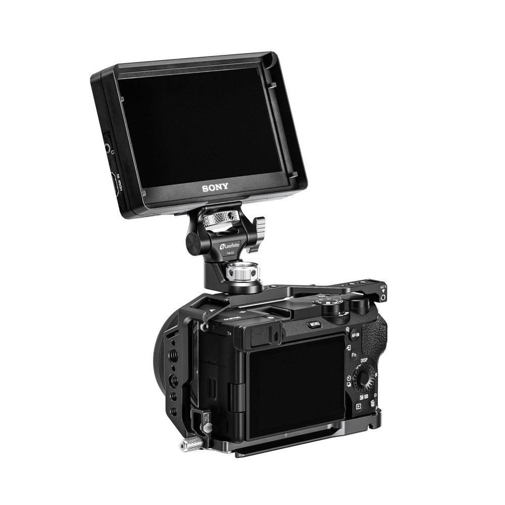 Sony monitor mounted on Leofoto ball head above professional video camera, showing integrated setup from side angle