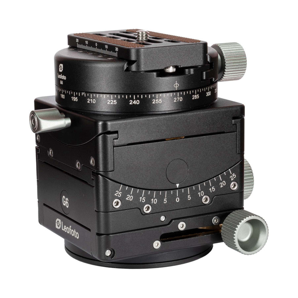 Black geared tripod head with dual panoramic scales, adjustment knobs, and quick release plate mounted on top, shown from three-quarter view.