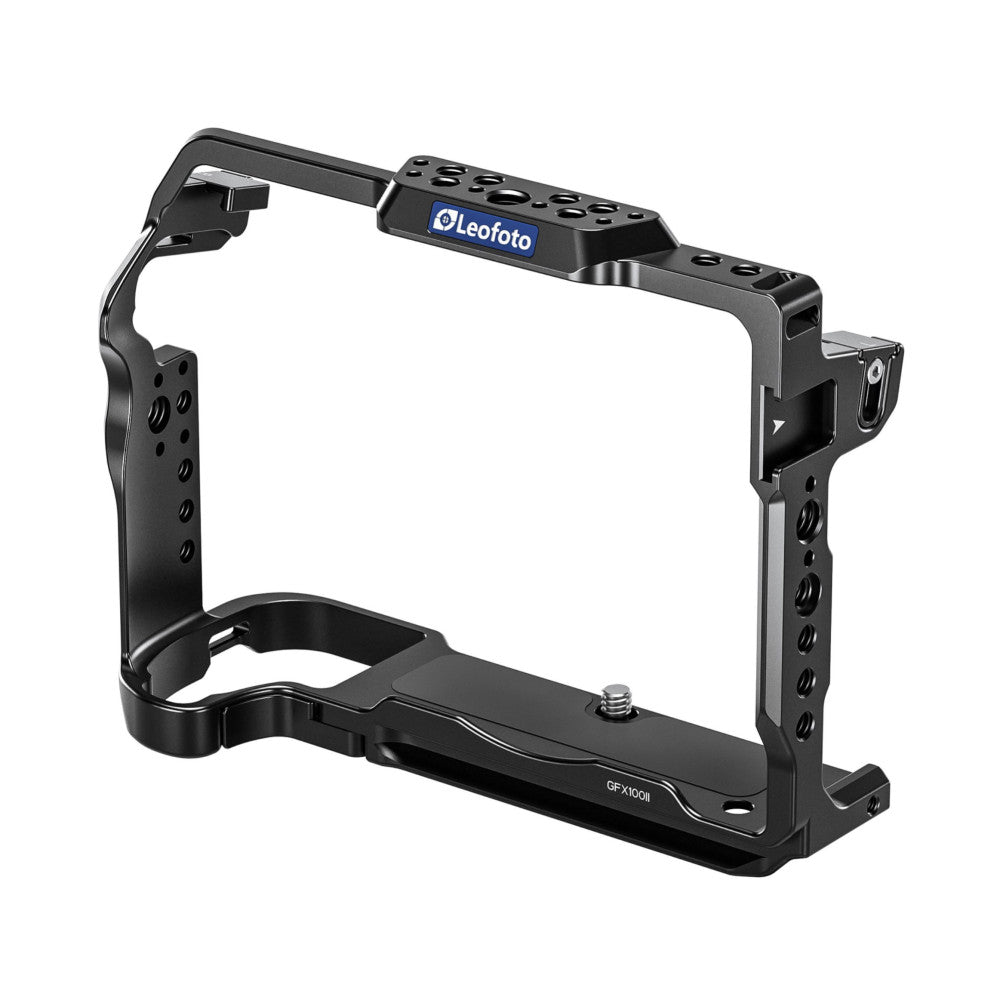 Black aluminum camera cage with top handle and side arms, displayed in three-quarter front view against white background.