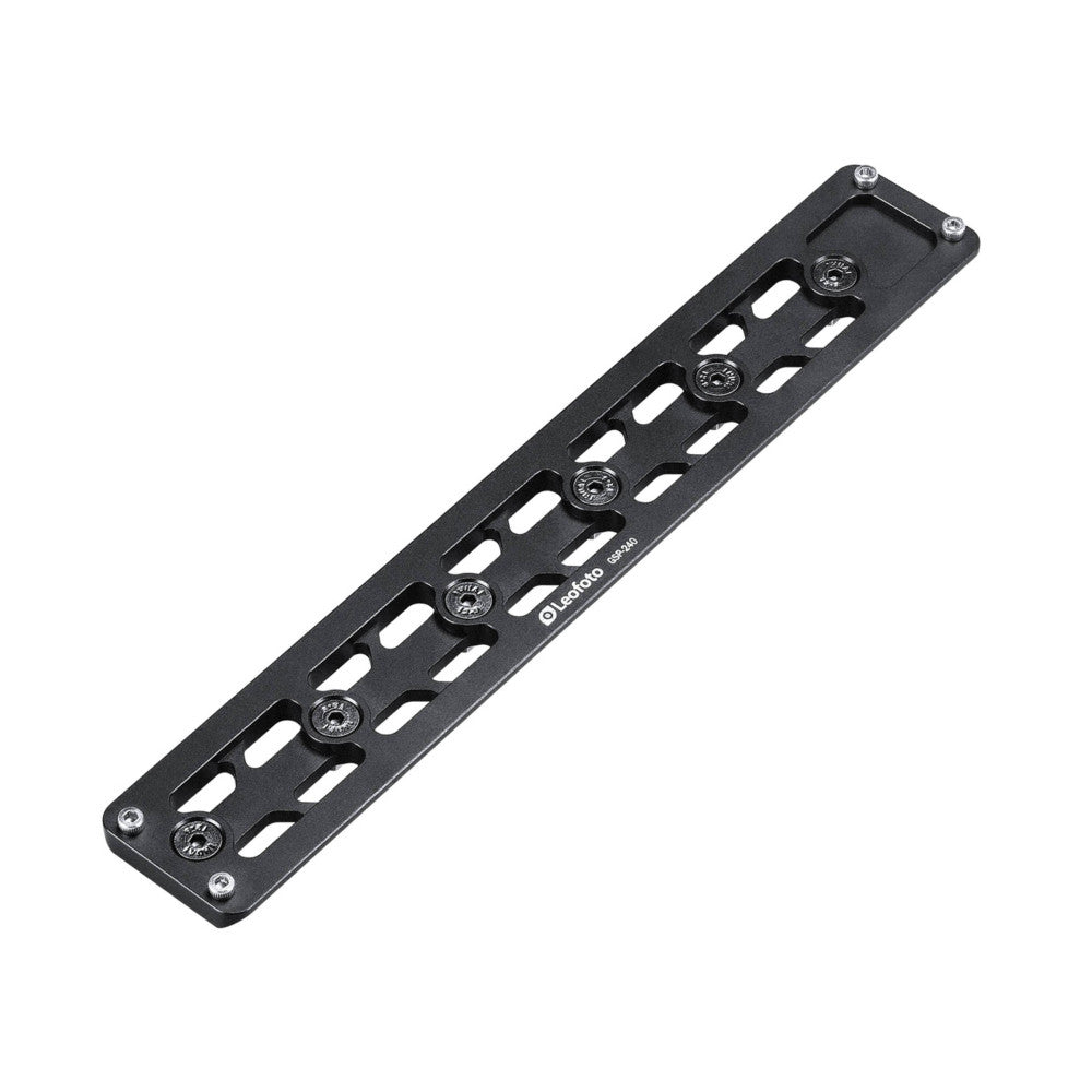 Black M-LOK quick release plate with multiple slots and adjustment knobs, shown at an angled top-down view against a white background.