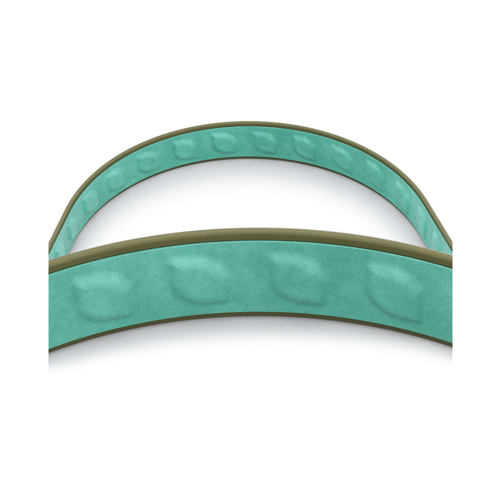 Close-up detail of a curved camera strap in pine green with a tan inner lining, showing the textured fabric and curved form against a white background.