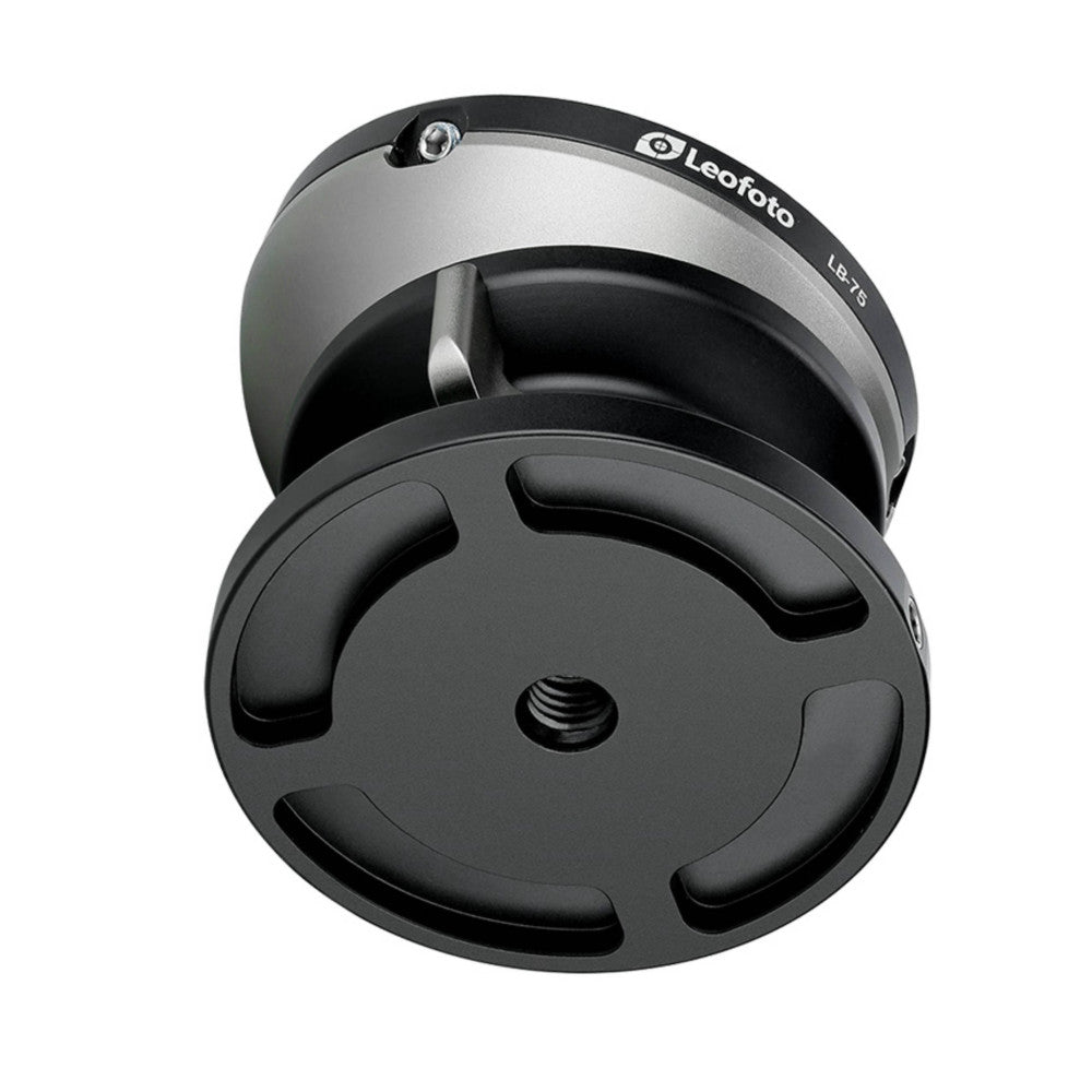 Leofoto LB-60N leveling base shown from above at an angle, displaying the spherical silver top mount and black circular base with grip handles and center adjustment knob.