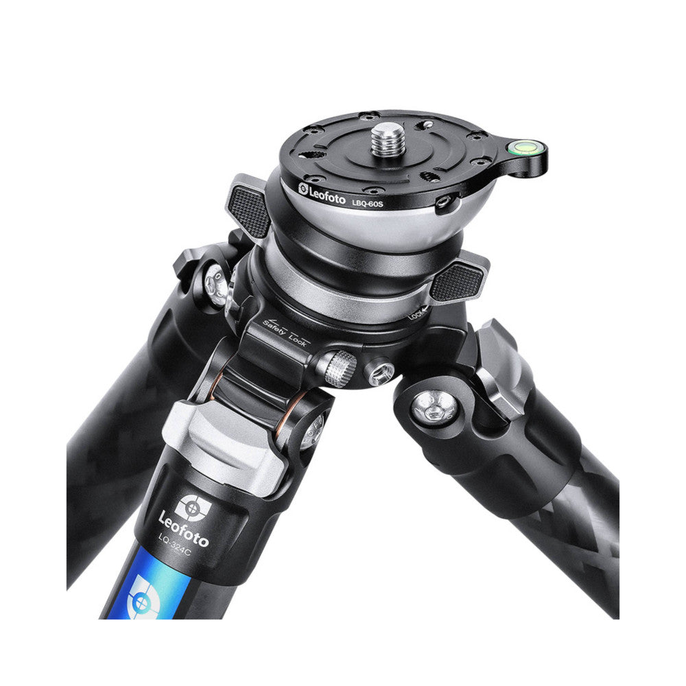 Leofoto LBQ-60S leveling base mounted on tripod legs, showing top view with adjustment mechanisms and bubble level visible.