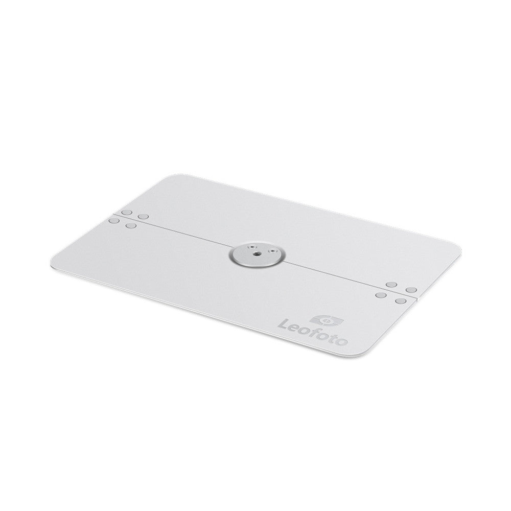 Isometric view of white Leofoto folding tray showing top surface with control buttons and central mounting point against white background.