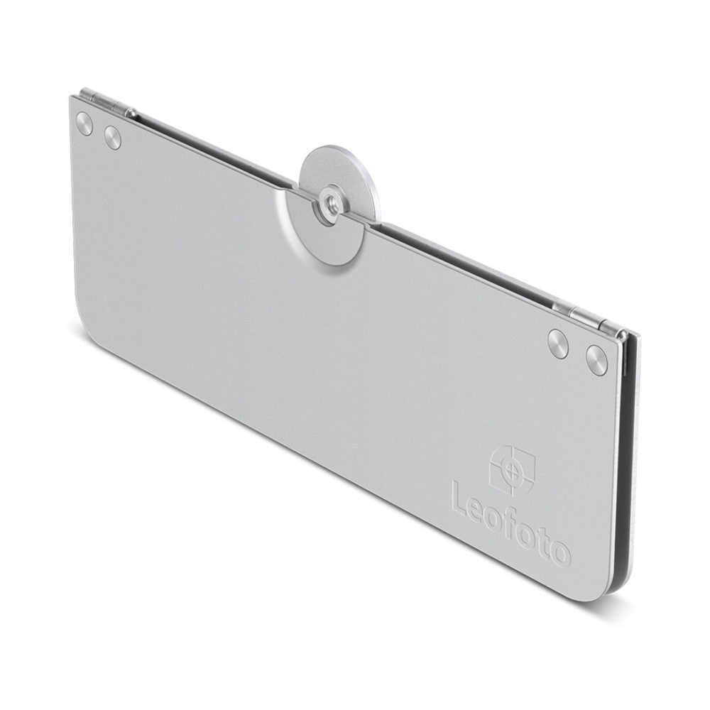 Isometric view of a silver folding tray with a circular knob attachment on top and mounting holes along the edges.