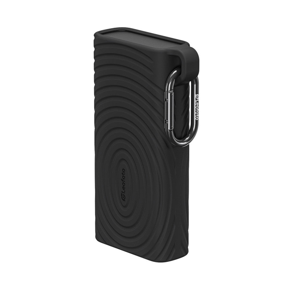 Black memory card reader case with concentric circular pattern design and metal carabiner clip, shown from angled side view against white background.