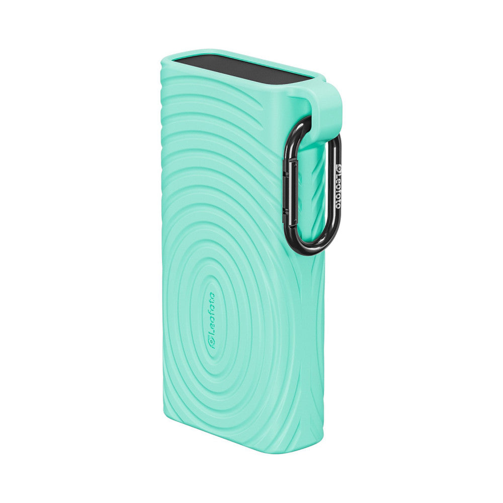 Tiffany blue memory card reader case shown at three-quarter angle, displaying wavy texture pattern, black carabiner clip, and open top slot.