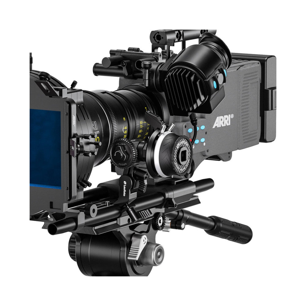 Professional cinema camera rig with Arri body, lens, matte box, and follow focus system mounted on support rods, side view.