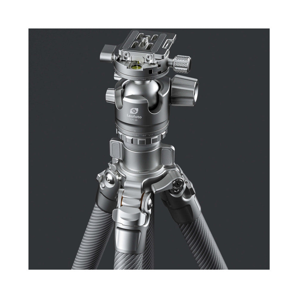 Leofoto tripod and ball head assembly shown from front angle against dark background, displaying silver metallic construction and carbon fiber legs.