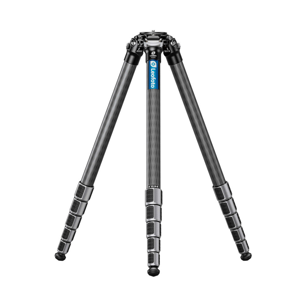Front view of a carbon fiber tripod with extended legs, showing the ball head mount, center column with blue branding, and textured leg sections.