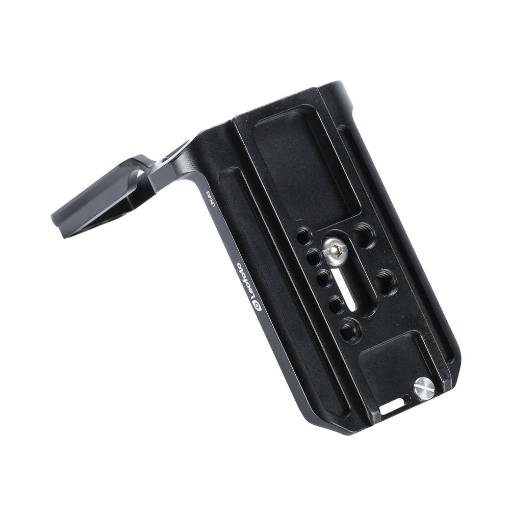 Black L-bracket with articulating arm shown from angled rear view, displaying mounting plate with adjustment knobs and metal feet.