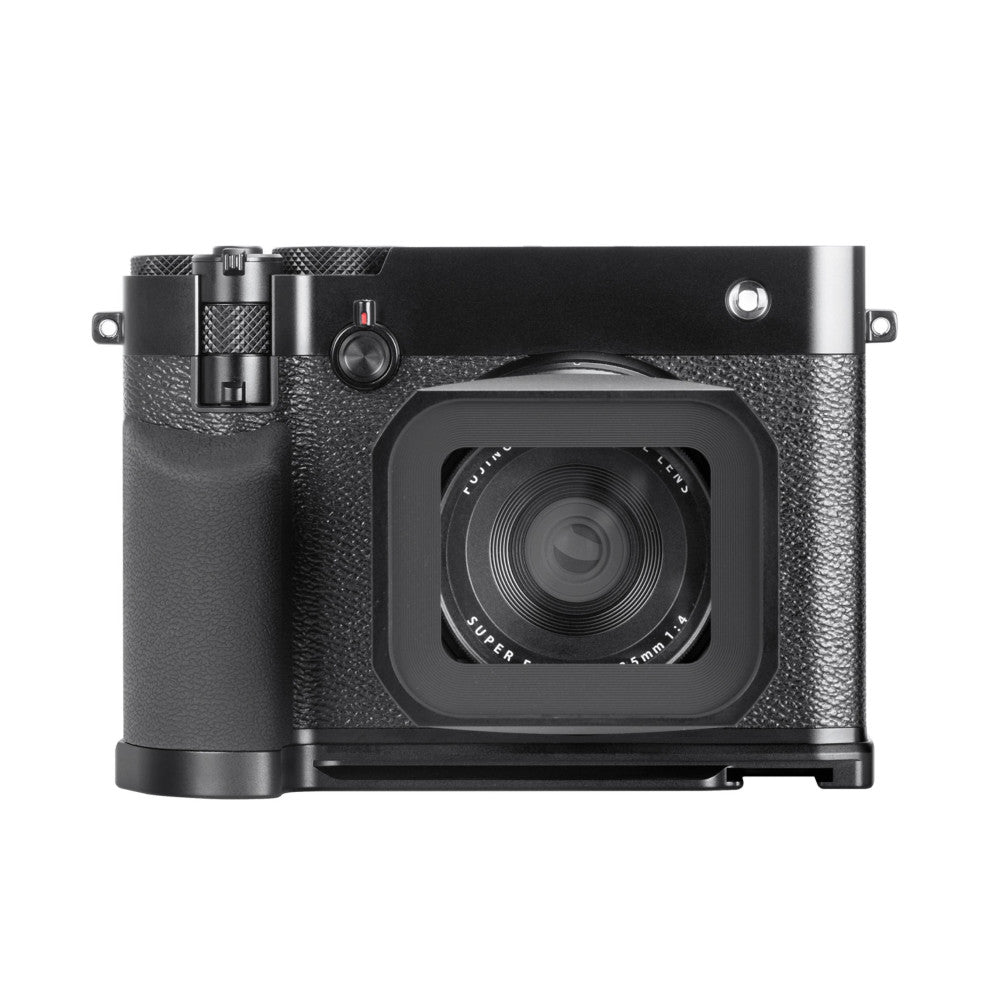 Black L-bracket mounted on Fujifilm GFX100RF camera, front-facing view showing lens and grip attachment points.