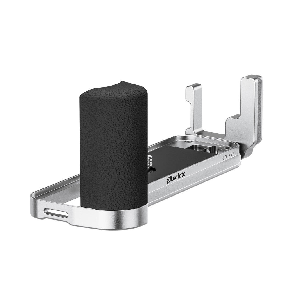 Silver metal L-bracket with textured black grip handle, shown in three-quarter view displaying mounting plate, side arms, and adjustment mechanisms.