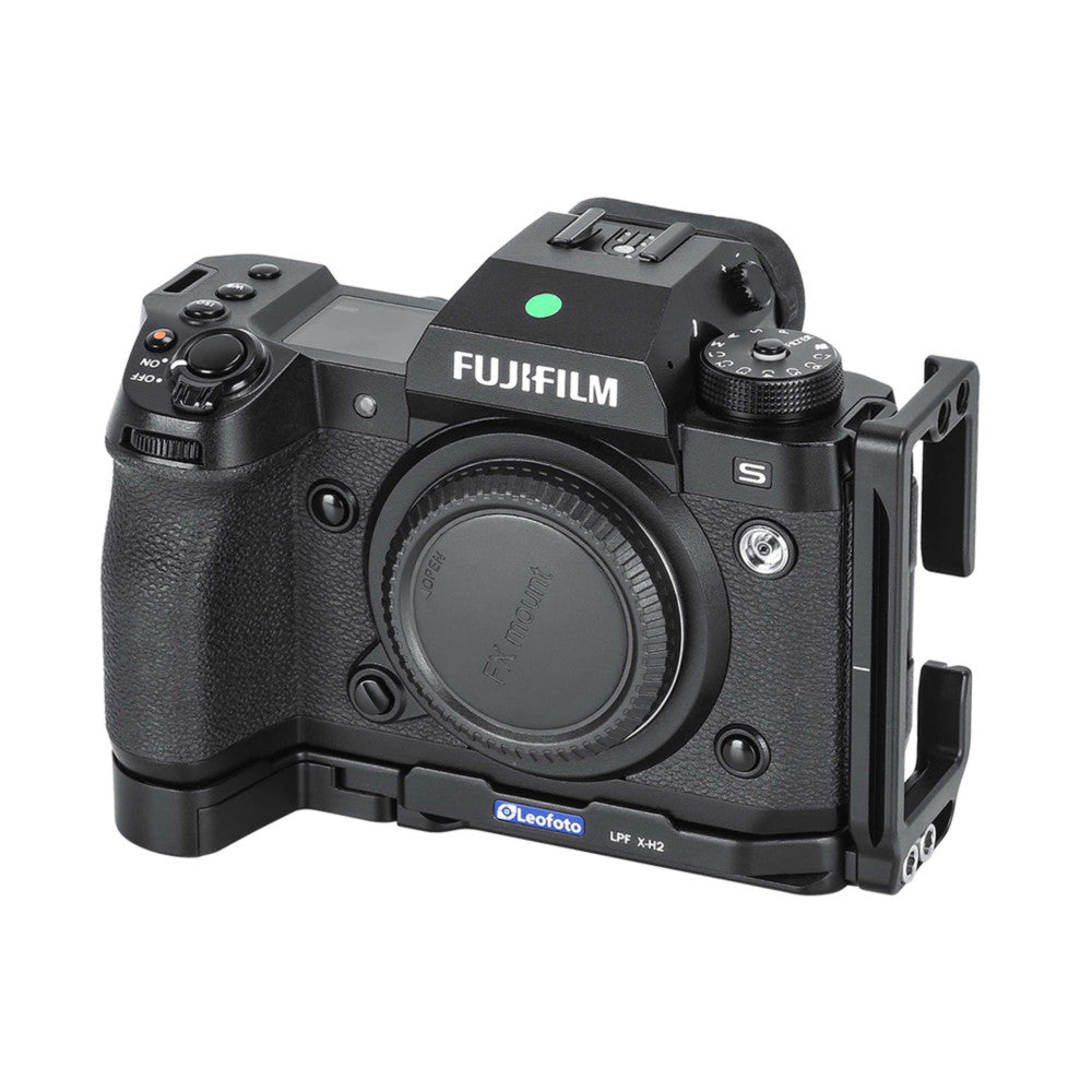 Fujifilm X-H2 camera mounted on a black Leofoto L-bracket, shown from a three-quarter front view against white background.