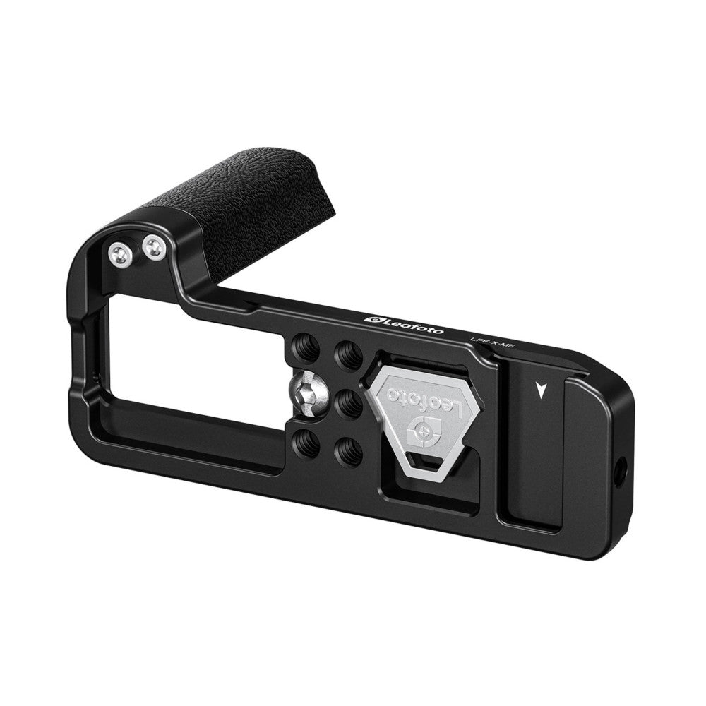 Black L-bracket with foam handle grip shown at an angle, displaying the hexagonal mounting plate and multiple threaded attachment points.