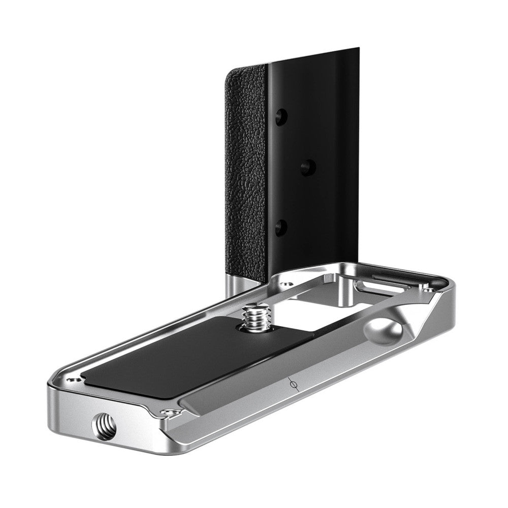 L-bracket shown at an angle, displaying the textured grip surface, metal base plate with tripod socket, and vertical mounting arm with three attachment points.