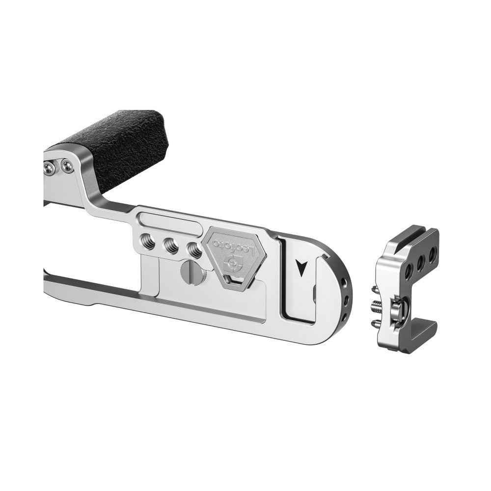 Silver L-bracket with black foam windscreen and detachable quick-release plate shown from side angle on white background.